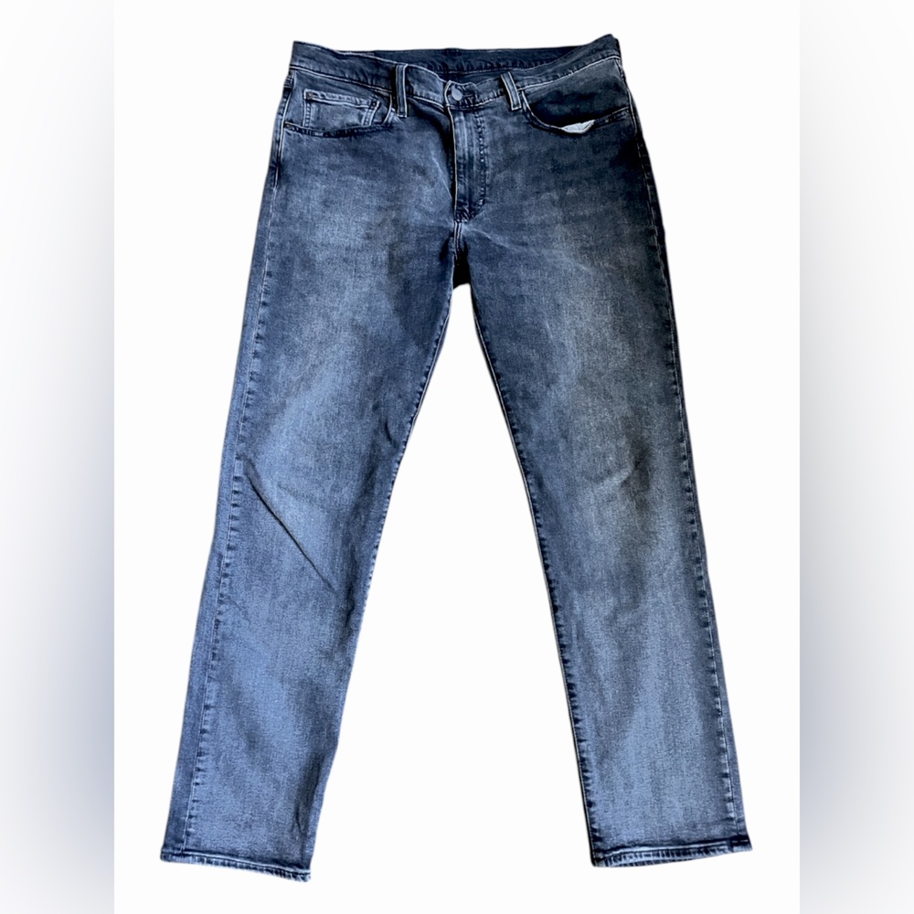 Levi’s 502 Mid rise taper jeans. Like new. Premium label. Grey wash.